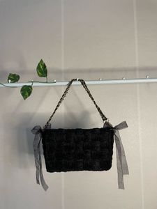 Chic Black Woven Clutch Bag with Chain Strap