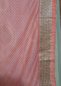 Beautiful Peachy Pink Saree with embroidery