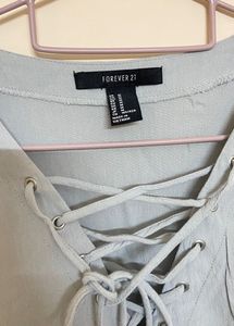 Brand- Forever21, cute top with front tie up, colo