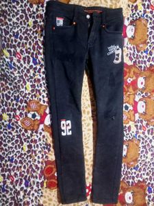 These Is A Black Colour Jeans For Boys.