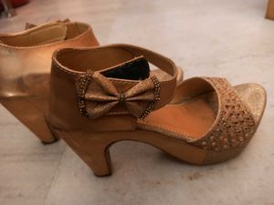 Gold Heels with Bow Detail