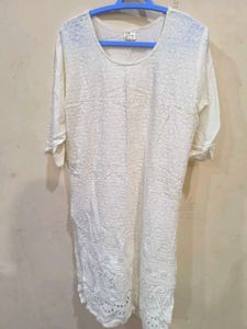 White chikankari kurti with clear sequins.
