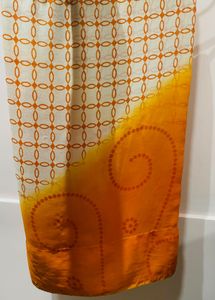 Orange sari with stitched blouse