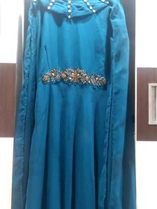 Beautiful Dress With The Attached Dupatta And Detailing On Waist And Neck