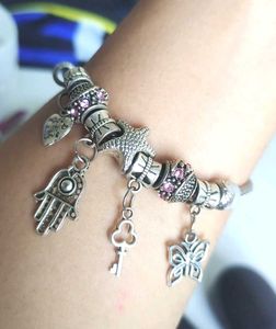 Charm Bracelet with Starfish, Key, and Butterfly C