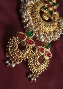 Rich Gold Jewellery Set Of One Detailed Worked Pendent With Two Royal Earings Completes Your Saree Look Perfectly
