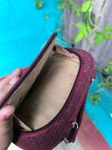 Maroon Shimmery Mini Handbag.
