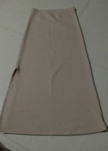 straight pencil skirt. beige. free size and streac