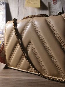 Lino Perros Quilted Sling Bag