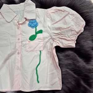 Stylish Pink Button-Up Shirt with Floral Applique