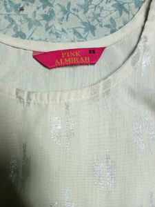 Sleeveless Beige Colour Kurti