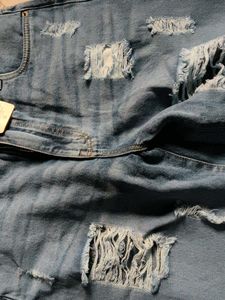 Distressed Denim Jeans