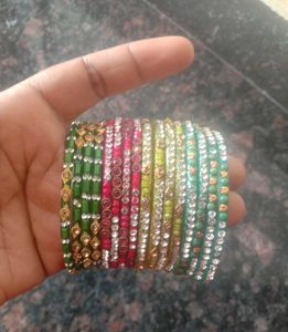 4 Sets Of Bangles