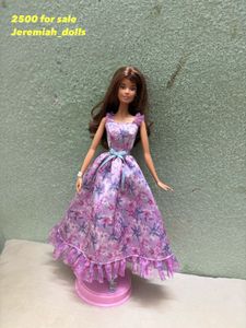 Barbie Doll in Floral Gown booking