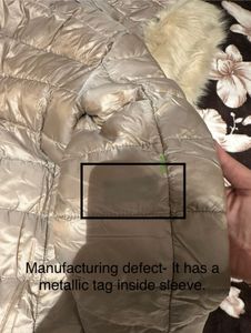 Light gold puffer jacket from Mango