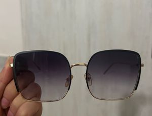 Black Sunglasses With Golden Frame