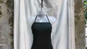 101511. Slinky Black Halter Dress