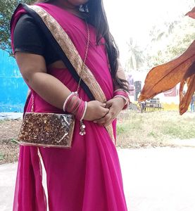 Elegant Pink Saree with Gold Border