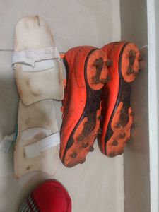 Orange Soccer Cleats with Guards