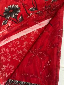 new red printed saree