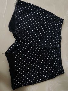 A beautiful black hipster shorts with polka dots.