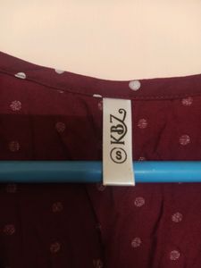 Polka Dot Peplum Style Maroon Top