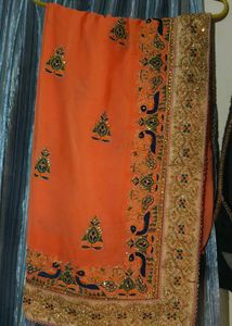 Elegant Orange Embroidered Saree