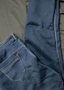 Distressed Blue Denim Jeans