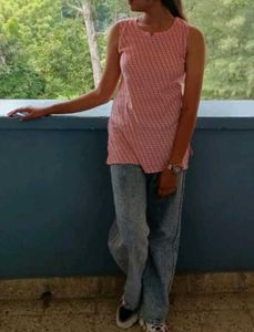 Pink Patterned Sleeveless short kurti