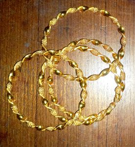 Golden Bangles (4 Pieces)