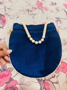 Elegant Heavy Blue Pearl Potli Bag with Tassels