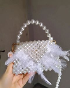 Pearl &amp; Feather Clutch