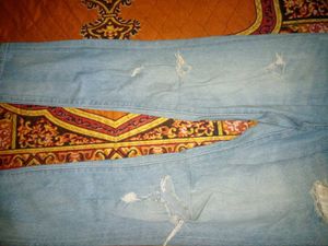 Ripped Light Wash Jeans