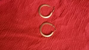 Gold decorative hoop Earrings.