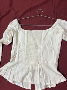 Elegant White Peplum Top
