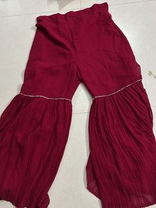 Red Mirror work lehanga with flared bottom and net