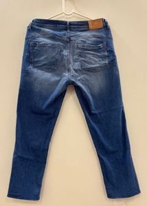 Distressed Denim Jeans