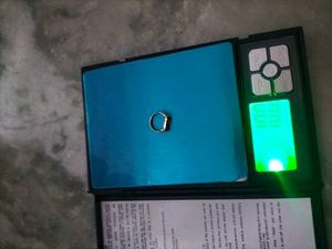 Gold Ring on Scale