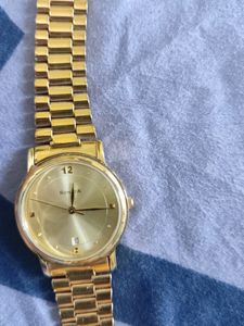 Men Watch With Golden Band.