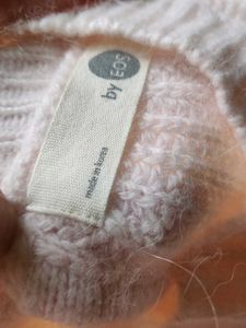 light pink sweater for cozy winters.