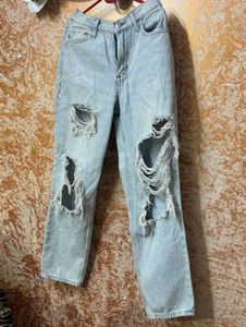 Distressed Light Wash Denim Jeans