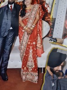 Orange Net Saree With Stone Work
