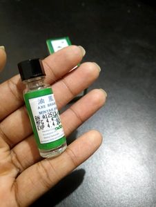axe brand universal pain relief oil, specially for headache, cold, cough and other body pains, manufactured in singapore and i bought from dubai, 1 bottle 3ml, 2 bottles for 99rs
