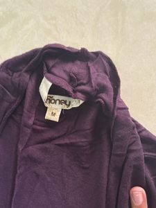 Purple shrug