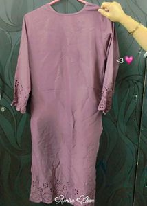A Purple Colour Kurti With Pant