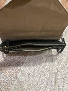 100% leather sling bag