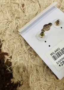 Thread pom pom earring