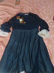 a gown with georgette fabric blue nd white colour