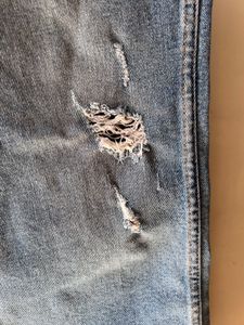 Levi’s Ripped Light Wash Jeans