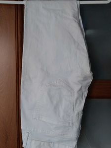 White Mid Raise Skinny Jeans